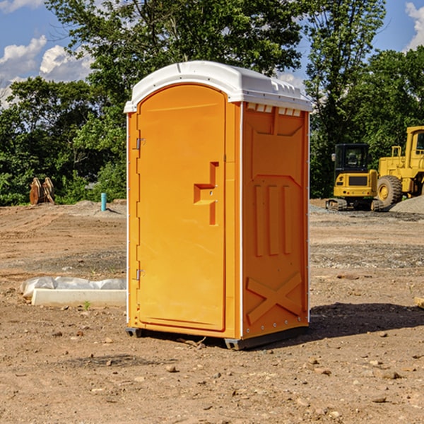 how often are the portable restrooms cleaned and serviced during a rental period in Falls City OR